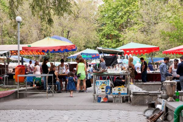 22626682-YEREVAN-ARMENIA-SEPTEMBER-21-tourists-on-street-market-Vernissage-in-Yerevan-Armenia-on-September-21-Stock-Photo.jpg